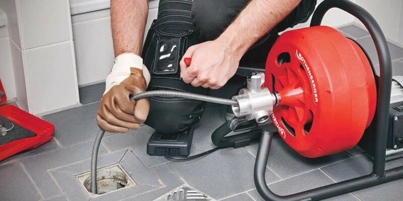 Drain cleaning service in Fayetteville, Georgia using professional plumbing equipment